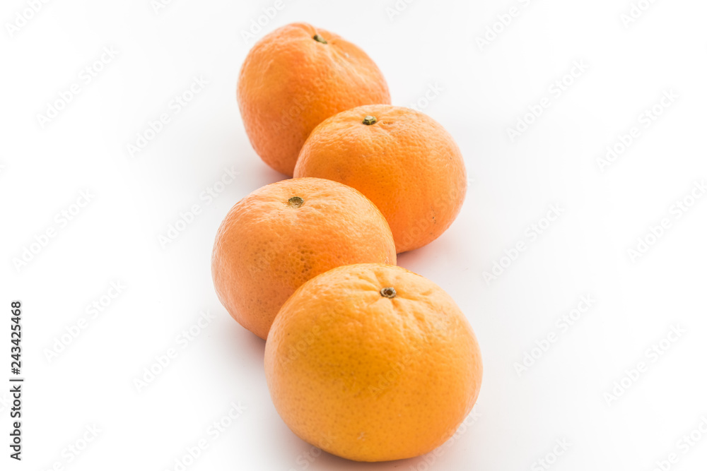 Ripe mandarines isolated on a white background Ripe mandarines isolated on a white background