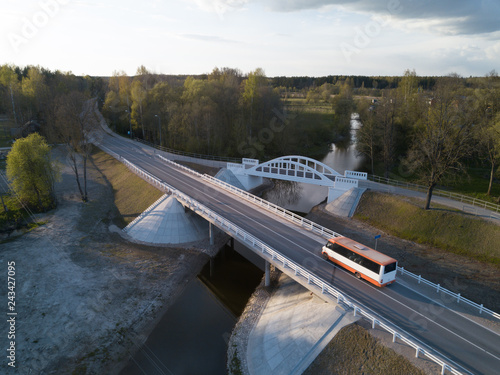 Pedistrian and auto bridge throught the river Vircava in Mezciems, Jelgava. Latvia. 