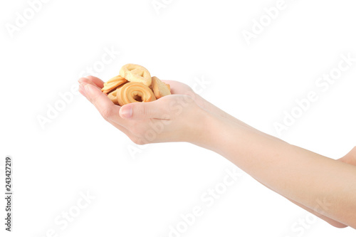Sweets placed on the palm indicate the giving on white background. clipping path.