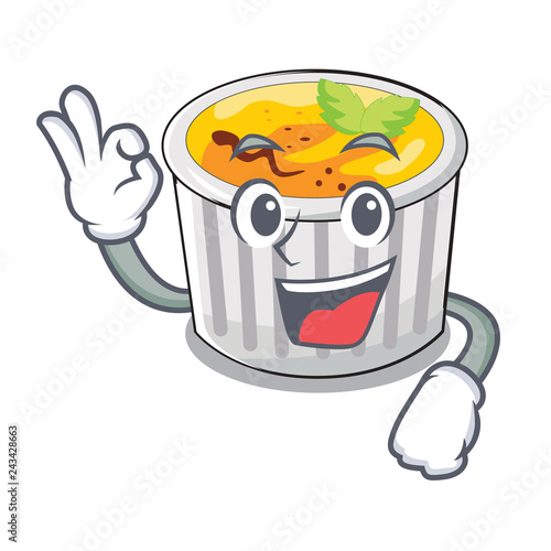 Okay creme brule in white cartoon bowl