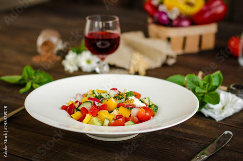 vegetables salad (tomato, cucumber, radish, pepper, arugula, onion, etc.). top, food background copy space