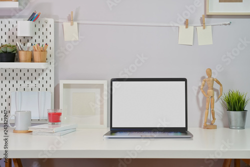 Minimalist stylish workspace isolated screen laptop and copy space © bongkarn
