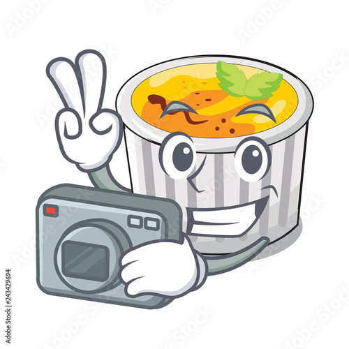 Photographer creme brulee on wooden character table