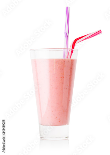 Berry smoothie or yogurt in tall glass with two straw