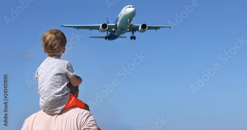Photos Father and son watching the landing planes