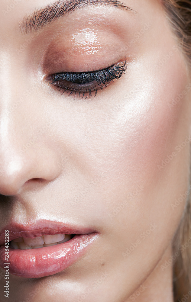 Fototapeta premium Closeup macro shot of female face and eyes makeup
