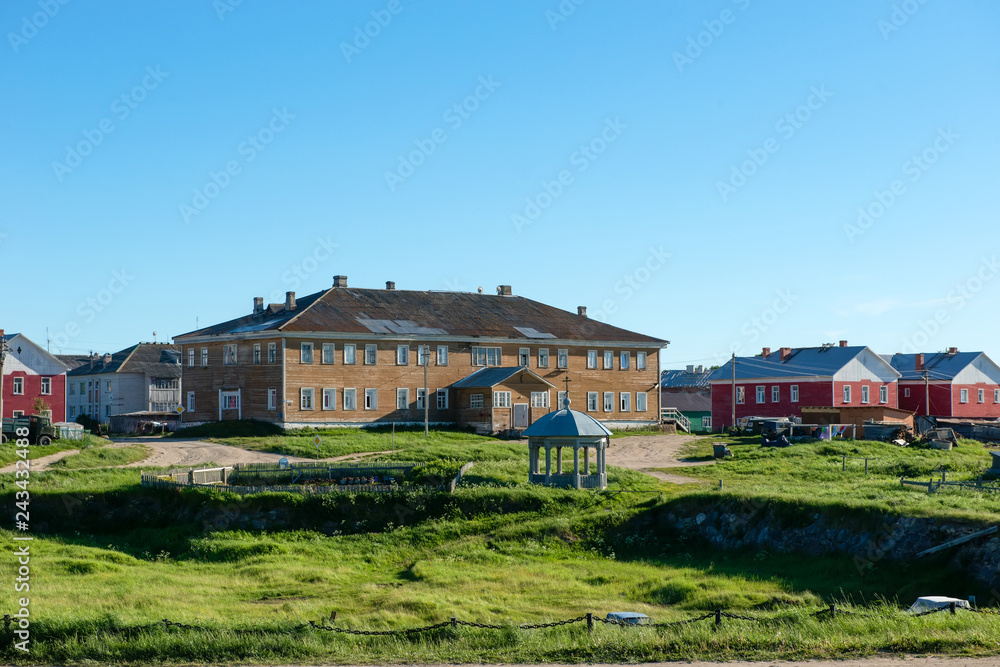 SOLOVKI, REPUBLIC OF KARELIA, RUSSIA - JUNE 27, 2018: The village of Solovetsky. The prison barrack of the period is USLON. It housed women prisoners. Currently, a dwelling house SOLOVKI, REPUBLIC OF KARELIA, RUSSIA - JUNE 27, 2018: The village of Solovetsky. The prison barrack of the period is USLON. It housed women prisoners. Currently, a dwelling house