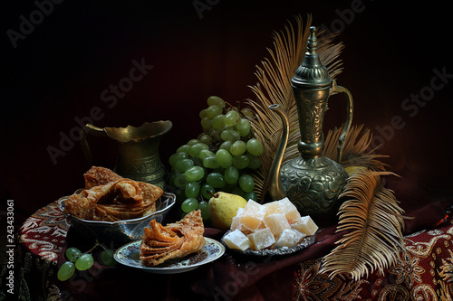 Still life with oriental sweets and kumgan photo