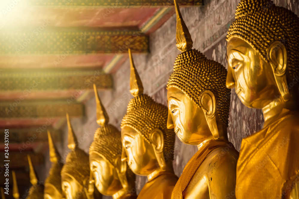 Obraz premium Golden Buddha Statue of Wat Suthat Devaravaram temple landmark of Bangkok, Thailand