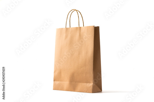 Brown paper shopping bag on white background