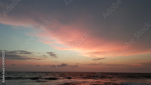 Red sky over the ocean © Sergei