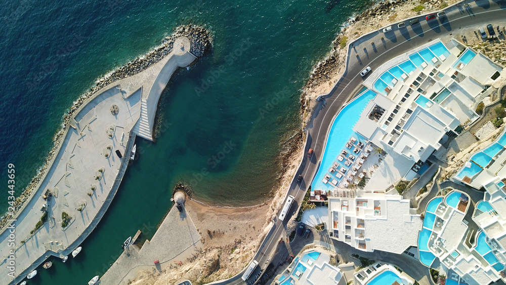 Aerial drone photo of luxury resort famous for number of pools in new public port of Mykonos island, Cyclades, Greece