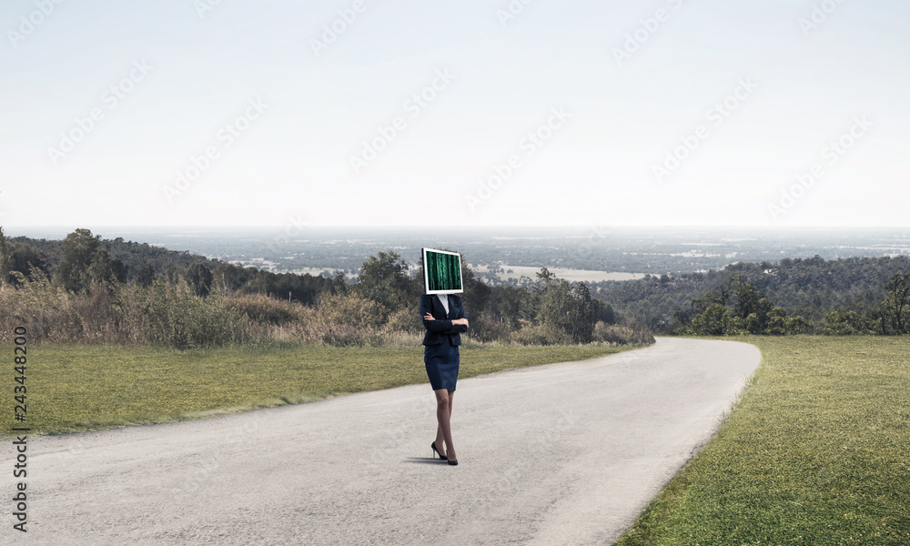 Obraz premium Business woman with monitor instead of head.