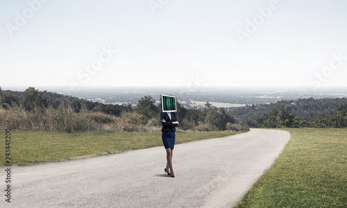 Business woman with monitor instead of head.