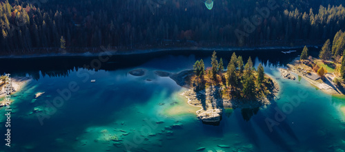 Flims lake at Switzerland drone aerial, alpine mountains, sunny, summer landscape, blue water panorama