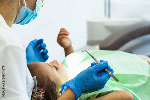 Child to the dentist. Child in the dental chair dental treatment