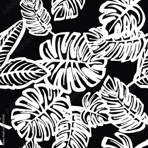 Tropical leaves pattern,seamless print in black and white,in vector.