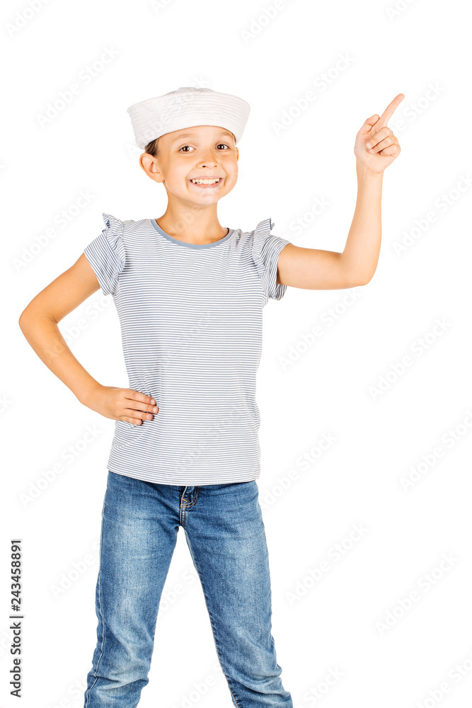 Little girl wearing a sailor costume and looking at the camera on white background. Little girl wearing a sailor costume and looking at the camera on white background.