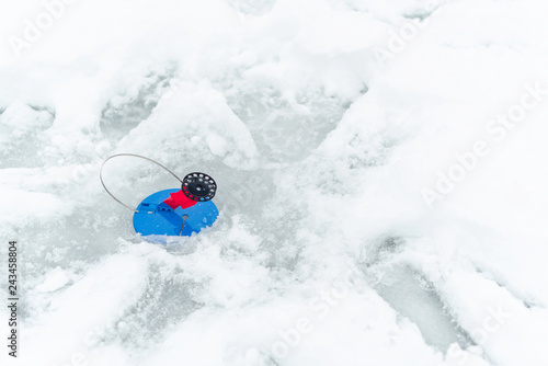 winter fishing from ice, ice fishing