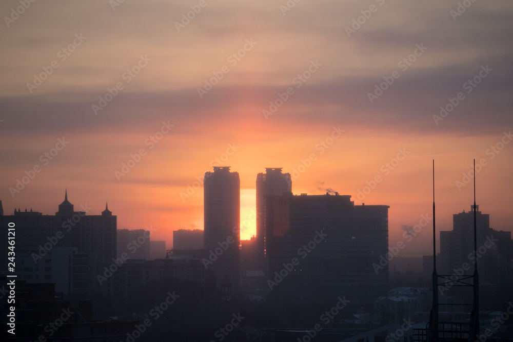 Sunrise over modern office buildings in business district center