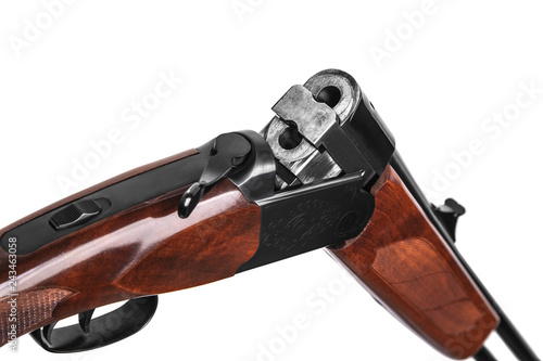 Opened double-barreled hunting rifle with 308-gauge rifled barrels isolated on white