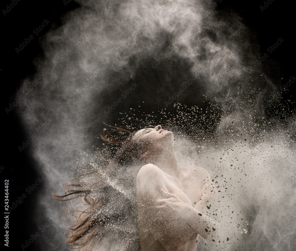 Woman in the nude in white dust cloud in the dark Stock Photo | Adobe Stock