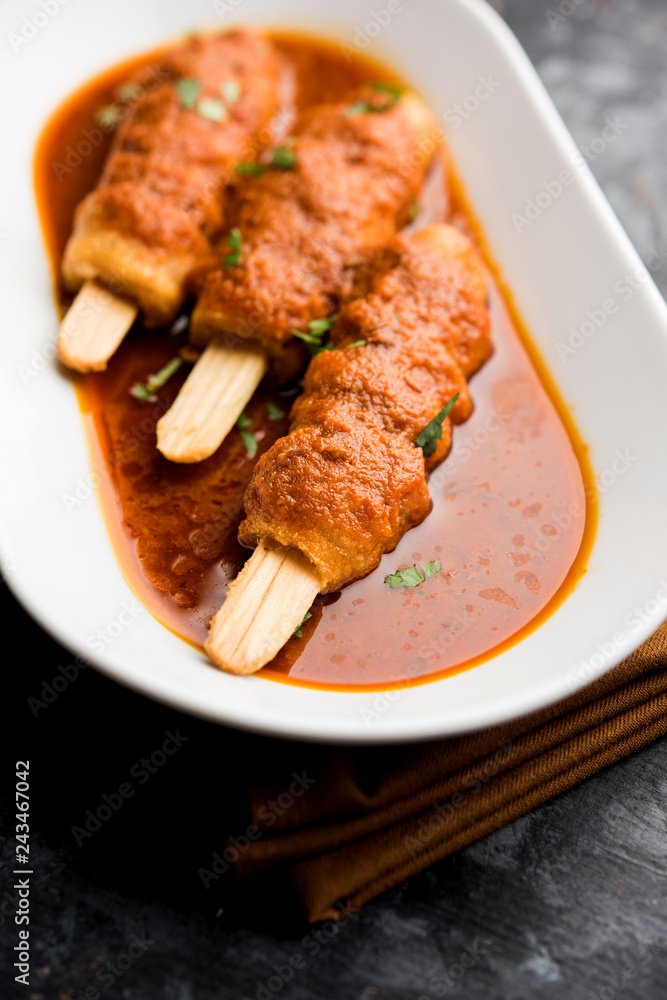 Soya Chaap Curry served in a bowl. Healthy recipe popular in India and Pakistan Soya Chaap Curry served in a bowl. Healthy recipe popular in India and Pakistan