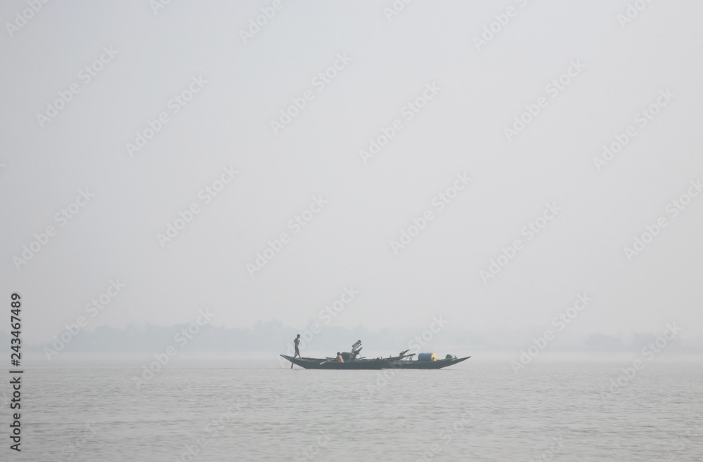 Misty morning on the holiest of rivers in India. Ganges delta in Sundarbans, West Bengal, India 