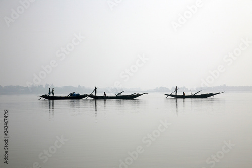 Misty morning on the holiest of rivers in India. Ganges delta in Sundarbans, West Bengal, India  photo