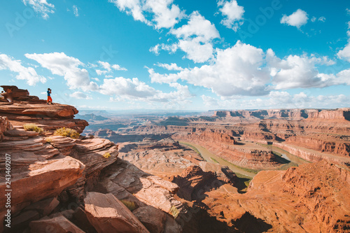 Obraz na płótnie Hiker on a cliff in Dead Horse Point State Park, Utah, USA w salonie