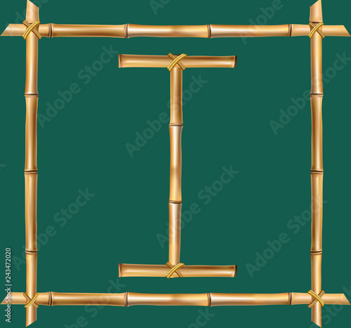Capital letter I made of realistic brown dry bamboo poles inside of wooden stick frame
