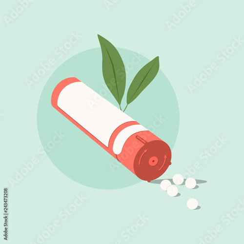 Homeopathic medicine on a green background. Homeopathic pills.Alternative medicine