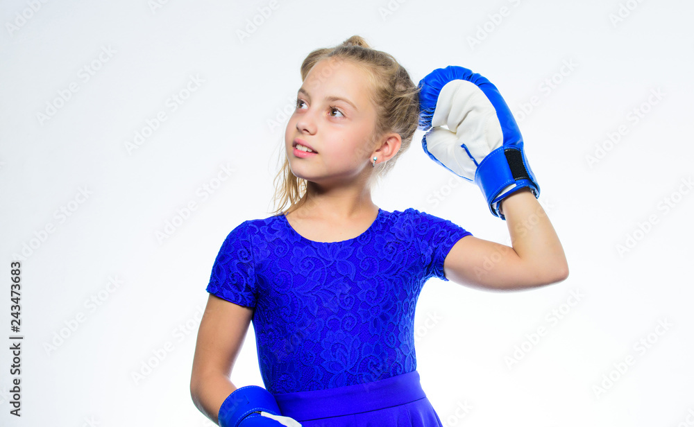 Be strong. Upbringing for leadership and winner. Strong child boxing. Sport and health concept. Boxing sport for female. Girl child with blue gloves posing on white background. Sport upbringing Be strong. Upbringing for leadership and winner. Strong child boxing. Sport and health concept. Boxing sport for female. Girl child with blue gloves posing on white background. Sport upbringing