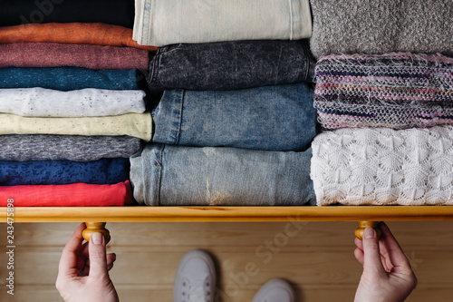 Neatly ordered clothes in drawer