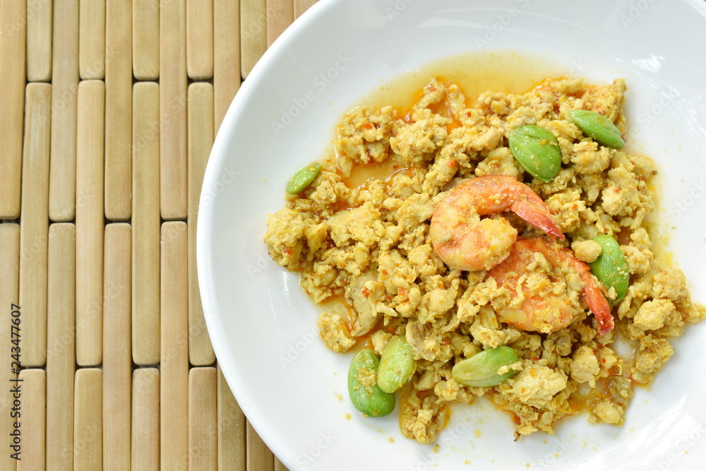 spicy stir fried twisted cluster bean with shrimp and chop chicken on dish spicy stir fried twisted cluster bean with shrimp and chop chicken on dish