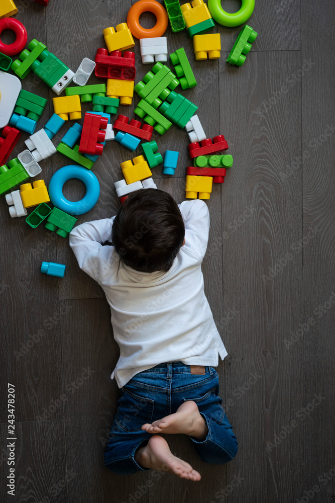 Happy baby playing with toy blocks. Happy baby playing with toy blocks.