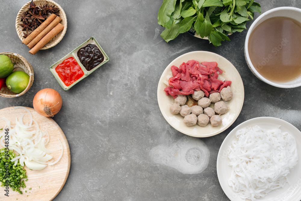 Stockfoto Traditional vietnamese noodle soups pho in bowls, concrete background. Vietnamese beef