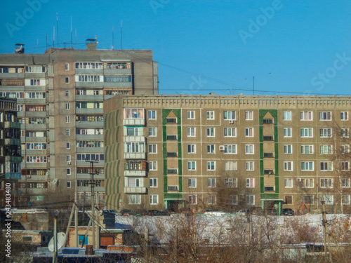 Apartment buildings. Residential area. Ust-Kamenogorsk (Kazakhstan). Blue sky. Apartment block. Cityscape