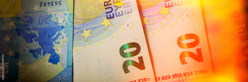 Euro paper notes are on the table. Web banner. Euro paper notes are on the table. Web banner.