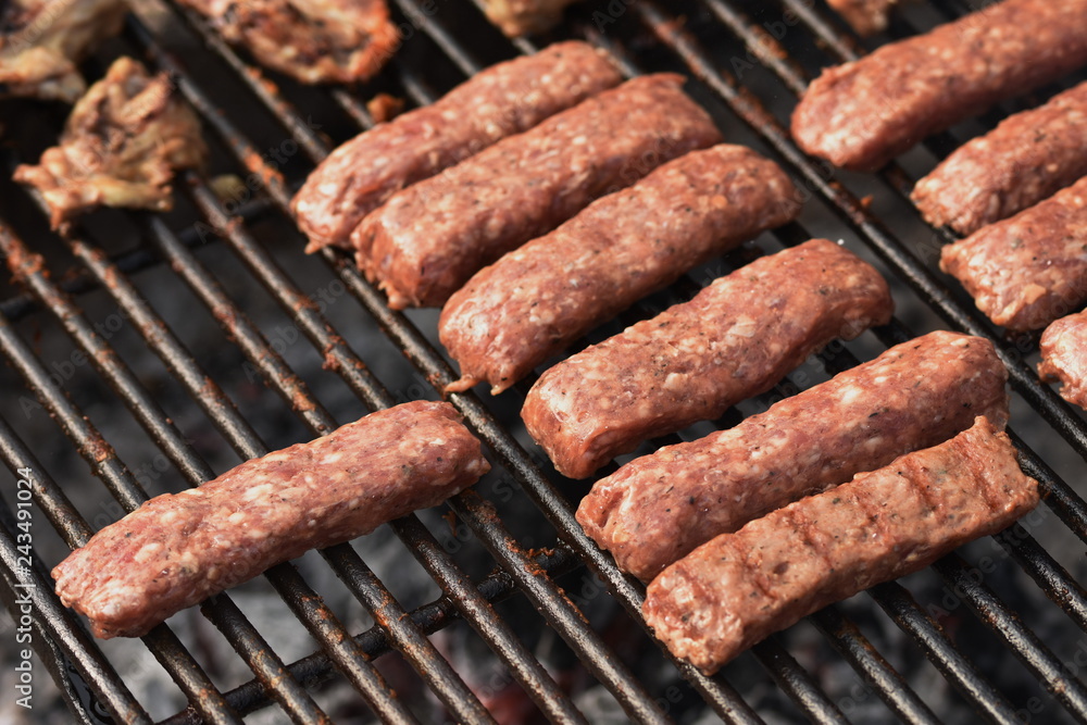 Traditional Romanian food, grilled meat rolls known as mititei