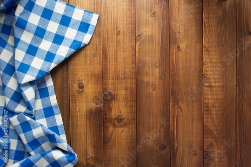 checked cloth napkin at wooden table