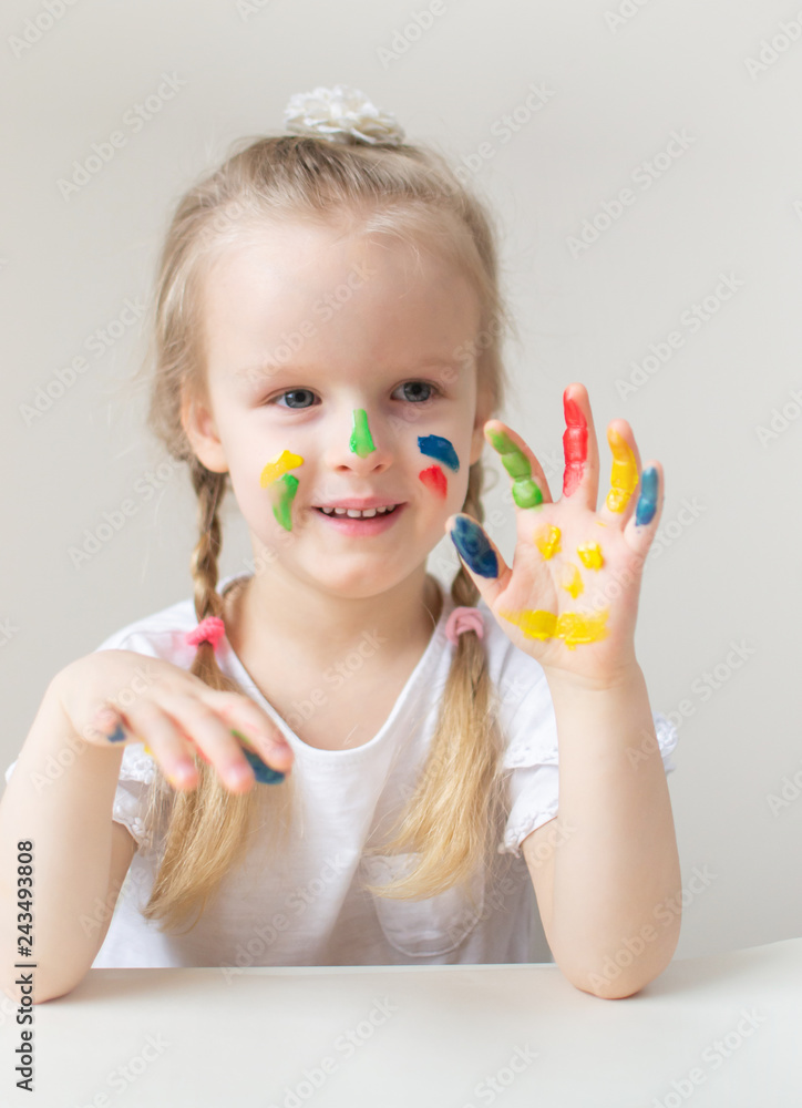 Caucasian Little Girl Painting with Colorful Hands Paints at Home Early Education Preparing for School Preschool Development Children Game Caucasian Little Girl Painting with Colorful Hands Paints at Home Early Education Preparing for School Preschool Development Children Game