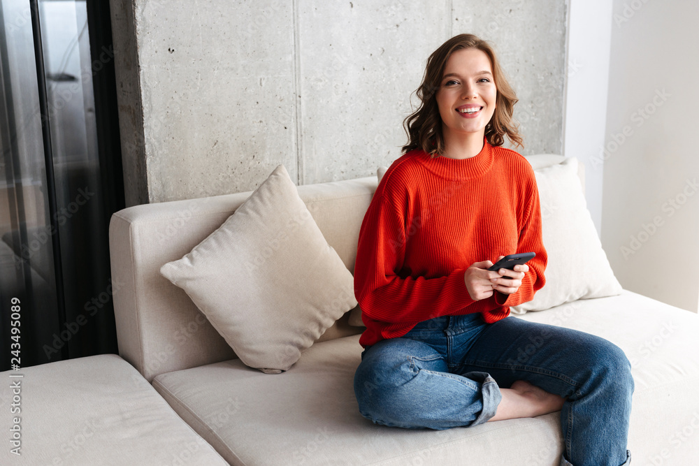 Cheerful young woman casually dressed Cheerful young woman casually dressed