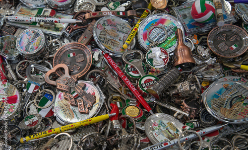 A pile of various souvenirs on the counter in the street of Rome