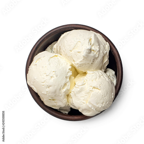 Bowl of vanilla ice cream isolated on white background. From top view