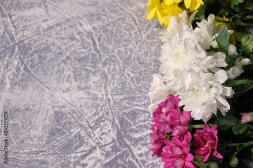 Colorful flowers on grey background.Bouquet of flowers