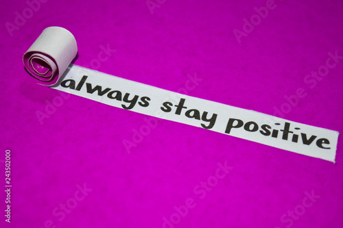 Always stay positive text, Inspiration, Motivation and business concept on purple torn paper