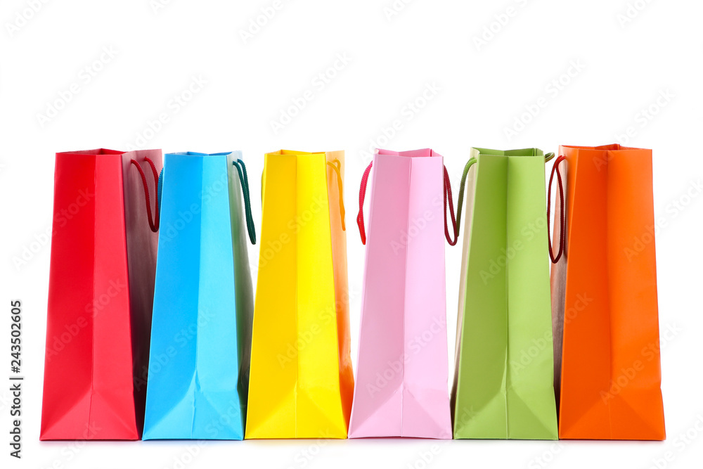 Colourful paper shopping bags isolated on white Colourful paper shopping bags isolated on white