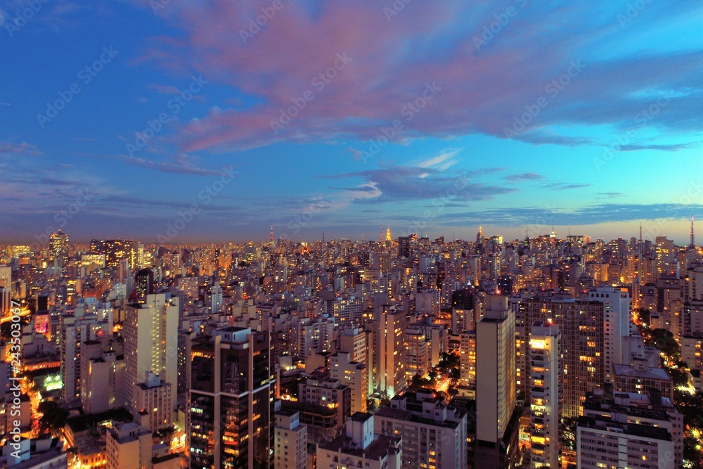 Aerial view of sunset on the city. Fantastic landscape. Great contrast and lightning. São Paulo, Brazil Aerial view of sunset on the city. Fantastic landscape. Great contrast and lightning. São Paulo, Brazil