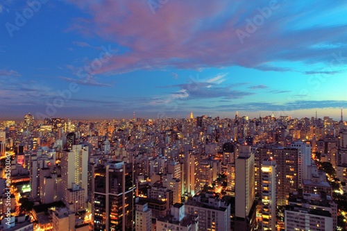 Aerial view of sunset on the city. Fantastic landscape. Great contrast and lightning. São Paulo, Brazil © ByDroneVideos
